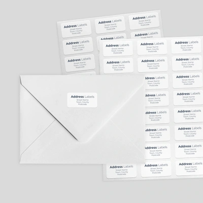 An example of a sheet of address labels and them being used on an envelope