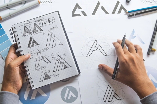 The process involved in creating a logo from scratch. The thought behind the concept and how this is applied across all literature to provide a strong brand awareness. 